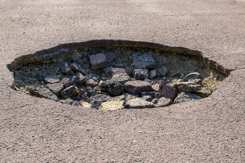 Asphalt Sinkhole Repair Service